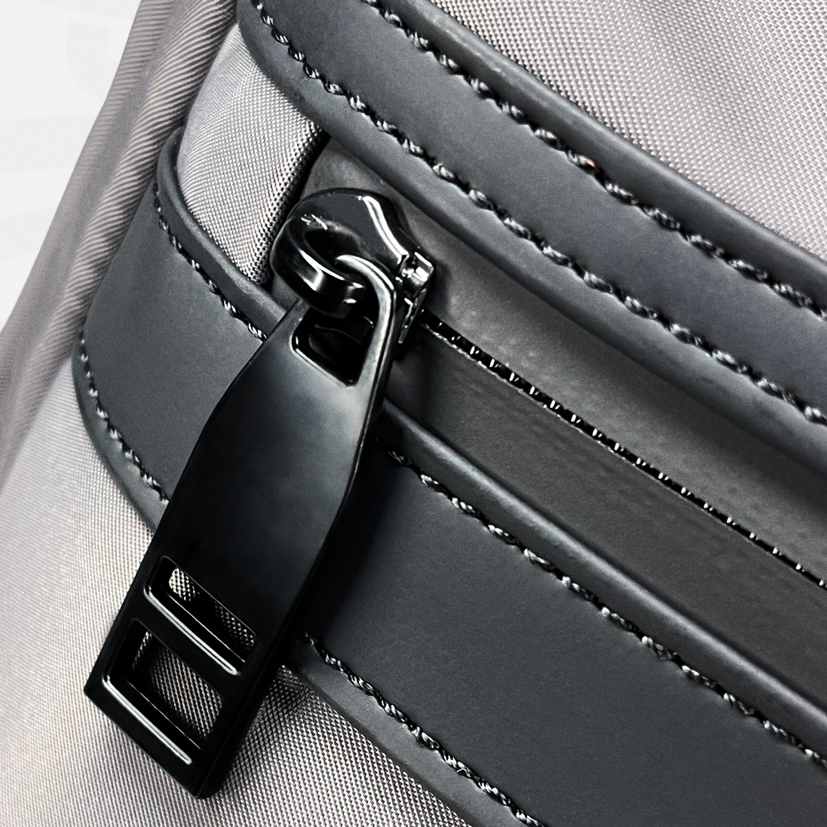 Aries Backpack — Gray - Aries front zipper pocket close-up